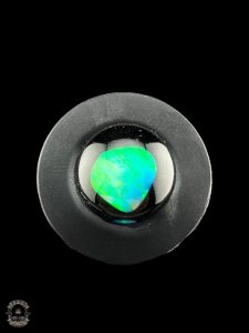 ENCASED OPAL OCULUS PLUG
