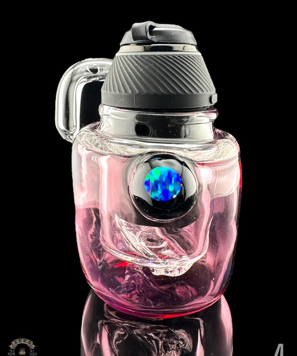 Alternative view of COOPERS GLASS: ENCASED OPAL COIN PUFFER PUFFCO PROXY ATTACHMENT