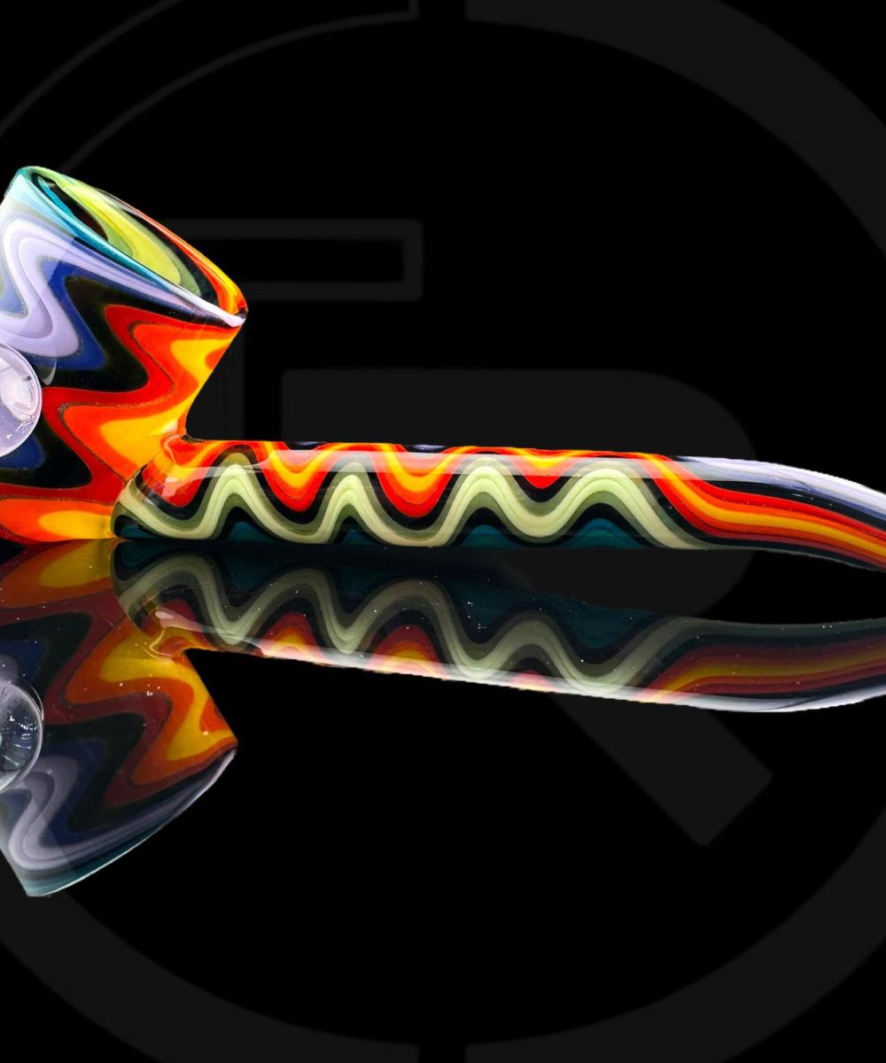 IRIDESCENT GLASS: WAG ENCASED OPAL PUFFCO PROXY ATTACHMENT